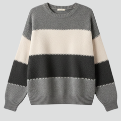 Women’s striped knit sweater with round neck and ribbed trim, from THE WHITMORE FAMILY, shown on a model.