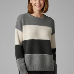 Women’s striped knit sweater with round neck and ribbed trim, from THE WHITMORE FAMILY, shown on a model.
