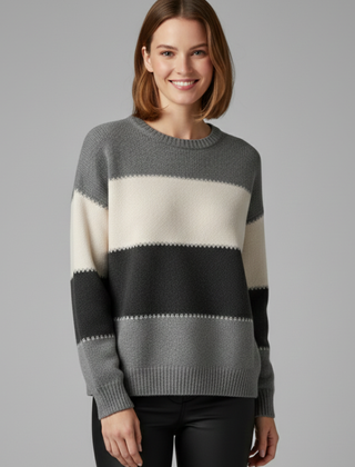 Women’s striped knit sweater with round neck and ribbed trim, from THE WHITMORE FAMILY, shown on a model.