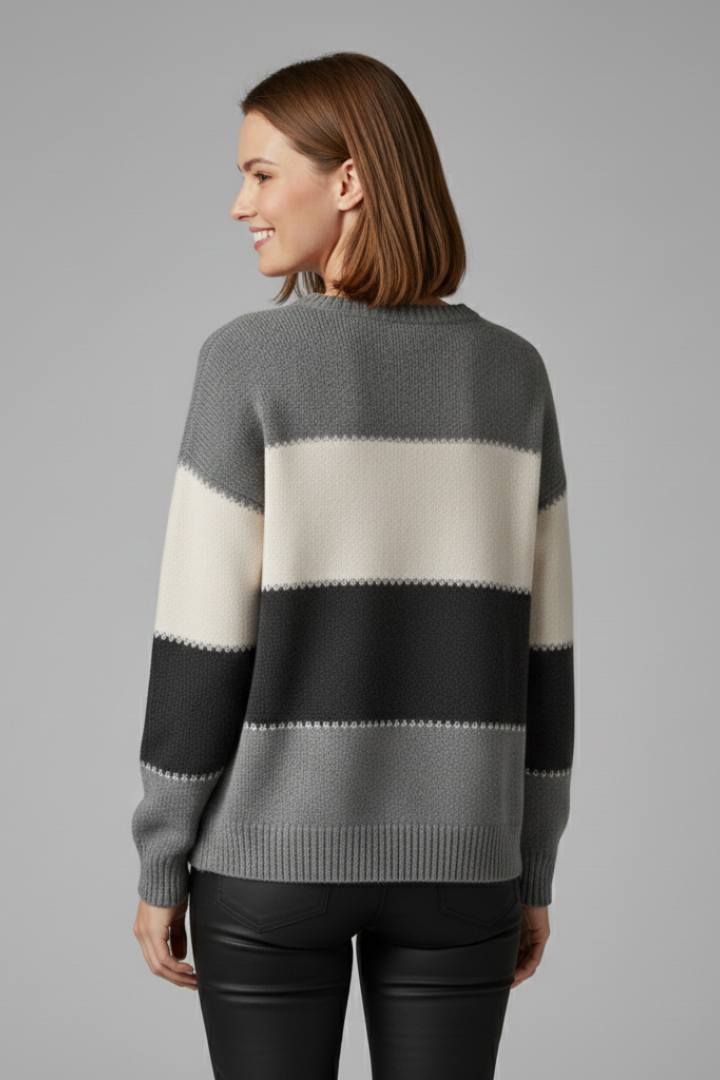 Women's striped knit sweater by THE WHITMORE FAMILY featuring a round neck and ribbed trim, cozy and stylish for casual wear.