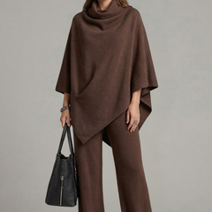 Women’s black top and trousers set with high neck and wide sleeves by THE WHITMORE FAMILY, stylish and comfortable for casual wear.