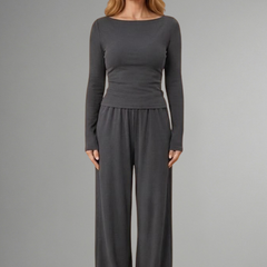 Women’s top and trousers set by THE WHITMORE FAMILY with relaxed fit, long sleeves, and comfortable casual style.
