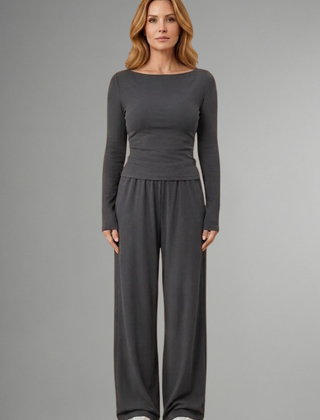 Women’s top and trousers set by THE WHITMORE FAMILY with relaxed fit, long sleeves, and comfortable casual style.