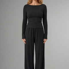 Women’s relaxed fit top and trousers set with long sleeves from THE WHITMORE FAMILY, casual and comfortable outfit.