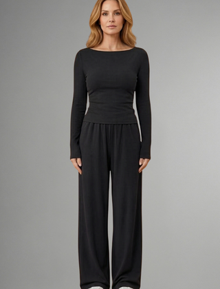 Women’s relaxed fit top and trousers set with long sleeves from THE WHITMORE FAMILY, casual and comfortable outfit.