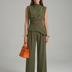Women’s top and trousers set with round neck and straight-leg fit, by THE WHITMORE FAMILY, shown in a stylish casual outfit.
