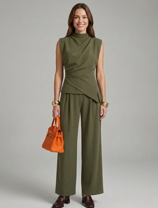 Women’s top and trousers set with round neck and straight-leg fit, by THE WHITMORE FAMILY, shown in a stylish casual outfit.