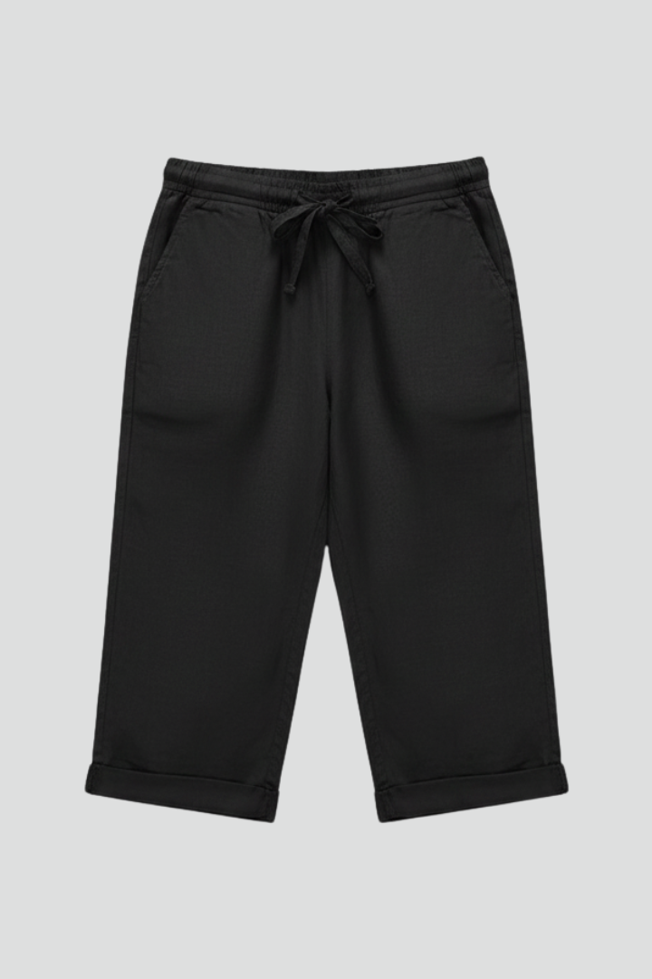 Beige women's knee-length trousers with high-waisted fit and straight legs from THE WHITMORE FAMILY.
