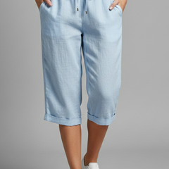 Beige women's knee-length trousers with high-waisted fit and straight legs from THE WHITMORE FAMILY.