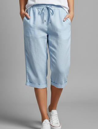 Beige women's knee-length trousers with high-waisted fit and straight legs from THE WHITMORE FAMILY.