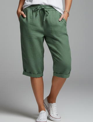 Women’s knee-length trousers with high-waisted fit and straight legs, by THE WHITMORE FAMILY, shown in a stylish and comfortable design.