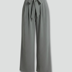 Beige women's palazzo trousers by THE WHITMORE FAMILY with a tie waist, flowing wide-leg style, perfect for casual or chic outfits.