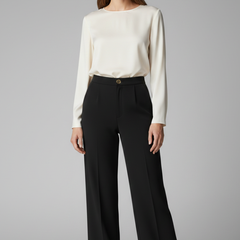 Women’s high-waist palazzo trousers with wide legs by THE WHITMORE FAMILY, shown in a stylish and comfortable fit.