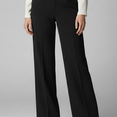 Women’s high-waist palazzo trousers with wide legs from THE WHITMORE FAMILY, shown in a stylish, flowy fit.