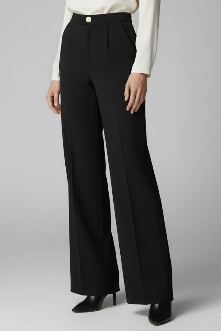Women’s high-waist palazzo trousers with wide legs from THE WHITMORE FAMILY, shown in a stylish, flowy fabric.