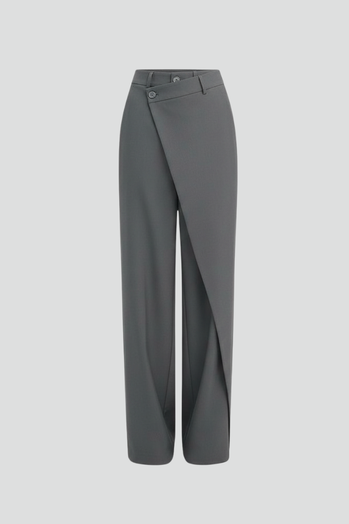Women's trousers by THE WHITMORE FAMILY featuring an asymmetric front design and straight-leg style, shown in the image.