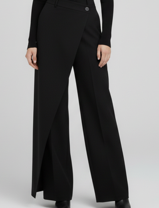 Women’s trousers with asymmetric front and straight legs by THE WHITMORE FAMILY, shown in a stylish, tailored fit.