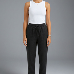 Women’s trousers with elasticated waistband and drawstring from THE WHITMORE FAMILY, featuring a comfortable, casual fit.