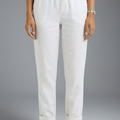 Women’s trousers with elasticated waistband and drawstring by THE WHITMORE FAMILY, featuring a comfortable, casual fit.