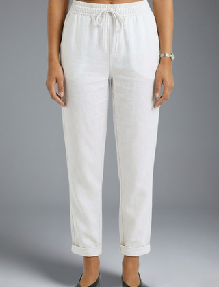 Women’s trousers with elasticated waistband and drawstring by THE WHITMORE FAMILY, featuring a comfortable, casual fit.