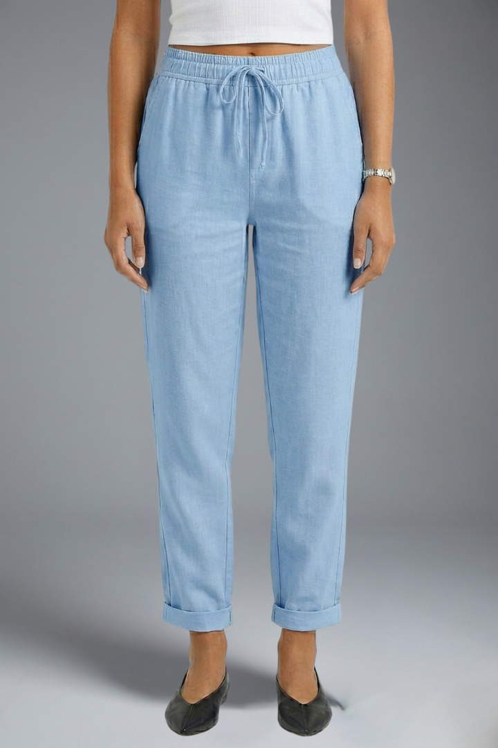 Women’s trousers with elasticated waistband and drawstring from THE WHITMORE FAMILY, featuring a comfortable, casual fit.