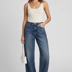 Women’s wide-leg jeans with pockets and fleece lining by THE WHITMORE FAMILY, in blue, featuring a relaxed fit and cozy interior.