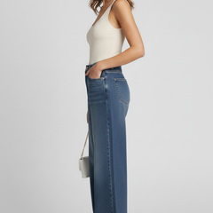 Women's wide-leg jeans by THE WHITMORE FAMILY, blue trousers with pockets and fleece lining, casual and comfortable fit.