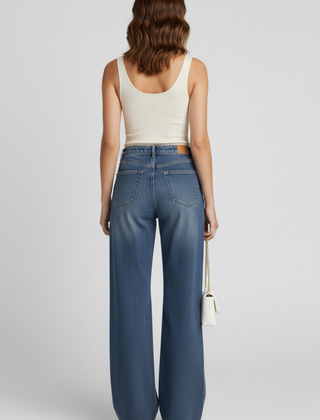 Women's wide-leg jeans with pockets and fleece lining by THE WHITMORE FAMILY, in blue denim, casual and comfortable trousers.