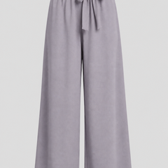 Women's trousers with tie waist and wide-leg design by THE WHITMORE FAMILY, shown in a stylish, relaxed fit.