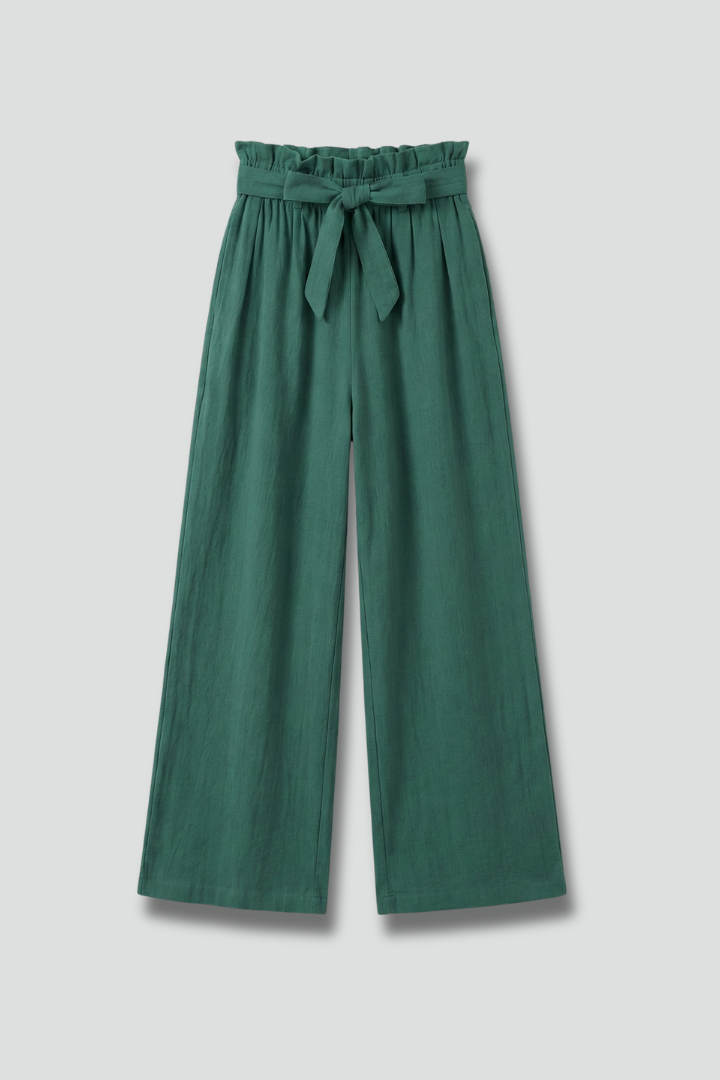 Women's green trousers with elastic waist and tie belt by THE WHITMORE FAMILY, featuring a relaxed fit and stylish design.