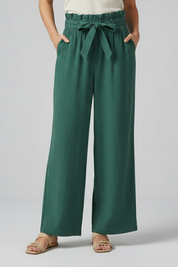 Women's green trousers with elastic waistband and tie belt from THE WHITMORE FAMILY, casual and comfortable fit.