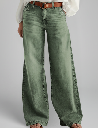 Women’s wide-leg jeans with high-rise waist and front closure from THE WHITMORE FAMILY, in green, shown on a model.