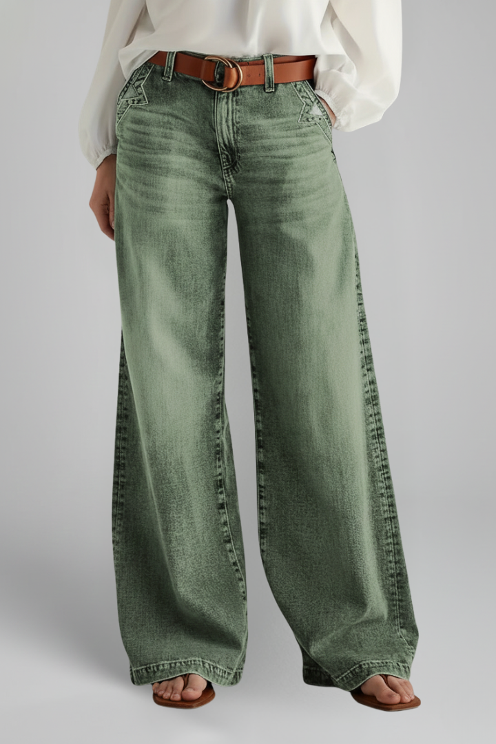 Women’s wide-leg jeans with high-rise waist and front closure from THE WHITMORE FAMILY, in green, shown on a model.