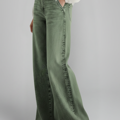 Women's wide-leg jeans with high-rise waist and front closure from THE WHITMORE FAMILY, shown in green.