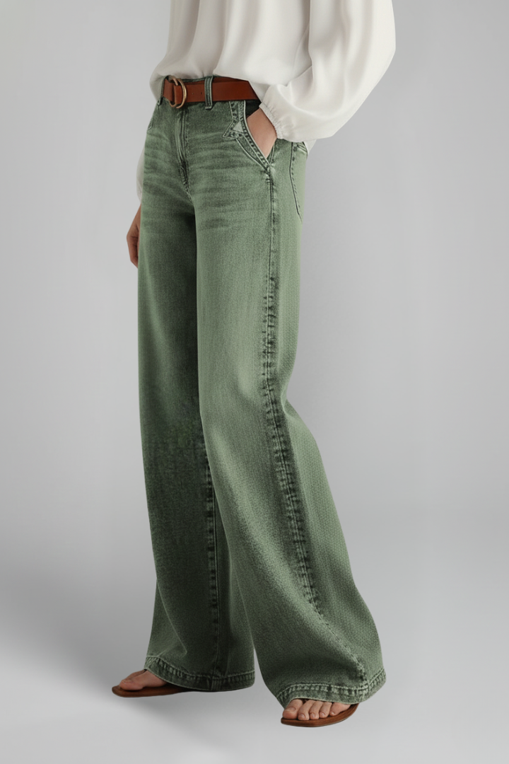 Women's wide-leg jeans with high-rise waist and front closure from THE WHITMORE FAMILY, shown in green.