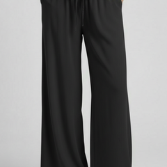 Light blue women’s palazzo trousers with drawstring waist and side pockets by THE WHITMORE FAMILY.