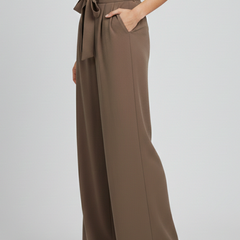 Light blue women’s Palazzo trousers by THE WHITMORE FAMILY with drawstring waist and side pockets, casual and comfortable fit.
