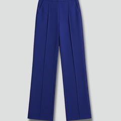Navy blue women's palazzo trousers with high waist and pleats from THE WHITMORE FAMILY, styled with a relaxed fit.