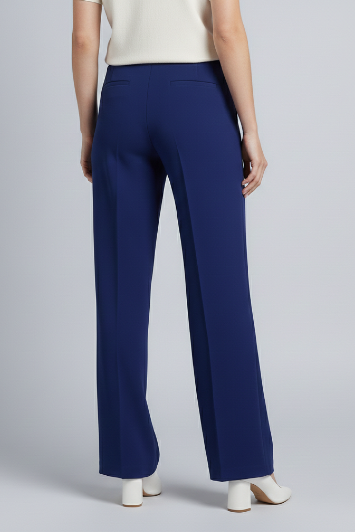 Navy blue women’s palazzo trousers with high waist and pleats, available from THE WHITMORE FAMILY.