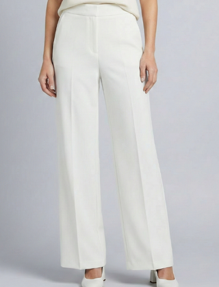 Navy blue women's palazzo trousers with high waist and pleats by THE WHITMORE FAMILY, featuring a relaxed, flowing fit.