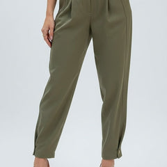 Olive green women's trousers with high waist by THE WHITMORE FAMILY, featuring a stylish and comfortable fit.