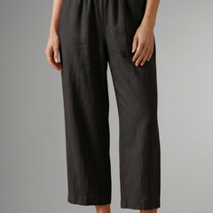 Pink women's trousers with elastic waistband and wide-leg fit from THE WHITMORE FAMILY, casual and comfortable for everyday wear.