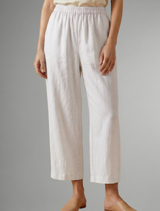 Pink women’s trousers with elastic waistband and wide legs, stylish and comfortable from THE WHITMORE FAMILY.