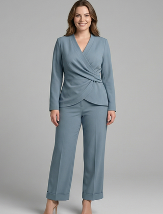 Women’s two-piece set with a wrap top and cropped trousers from THE WHITMORE FAMILY, styled for casual or office wear.