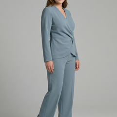 Women’s two-piece set with wrap top and cropped trousers by THE WHITMORE FAMILY, styled for casual or chic looks.