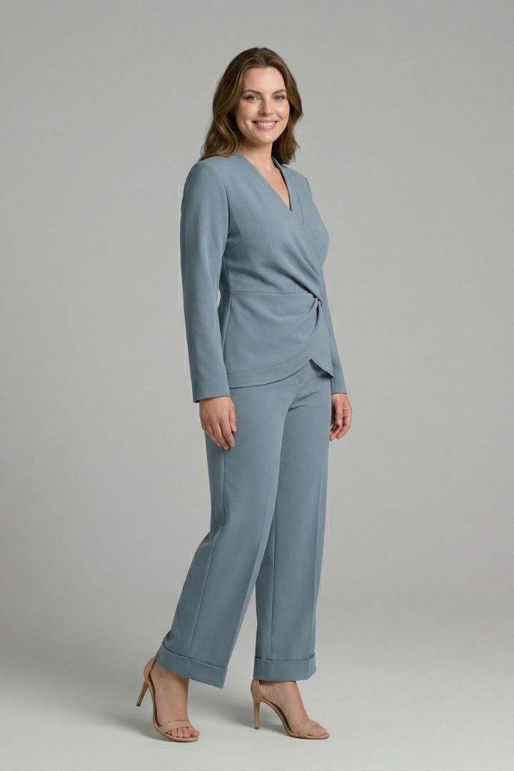 Women’s two-piece set with wrap top and cropped trousers by THE WHITMORE FAMILY, styled for casual or chic looks.