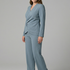 Women’s two-piece set with wrap top and cropped trousers from THE WHITMORE FAMILY, styled for casual or office wear.