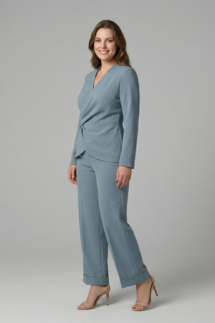 Women’s two-piece set with wrap top and cropped trousers from THE WHITMORE FAMILY, styled for casual or office wear.