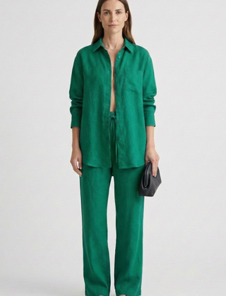 Beige women’s two-piece set with button shirt and straight trousers from THE WHITMORE FAMILY, styled for casual or office wear.