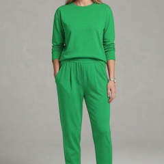 Black women's two-piece set with crew neck top and tapered trousers by THE WHITMORE FAMILY, casual stylish outfit.